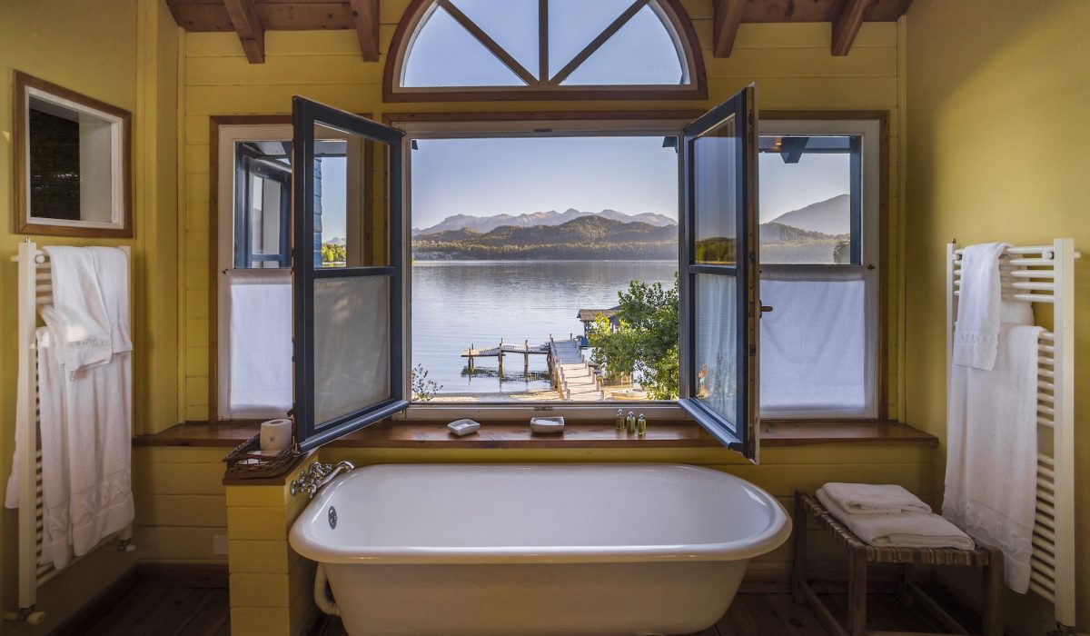 Bathroom and bath with amazing views of a lake and mountains, perfect for relaxing, Patagonia, Argen